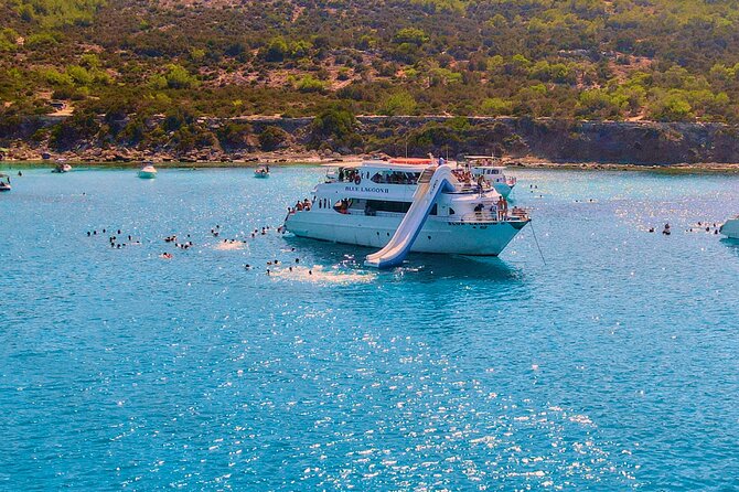 Blue Lagoon (Akamas) Bus & Boat Tour with Water Slide From Paphos - Fruit, lemonade, and wine on the return