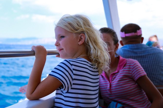 Blue Lagoon and Aphrodite's Baths Guided Day Tour from Paphos - Boarding the boat at Latchi
