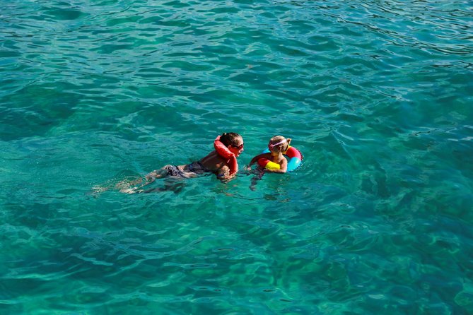 Blue Lagoon and Aphrodite's Baths Guided Day Tour from Paphos - Swimming at the Blue Lagoon