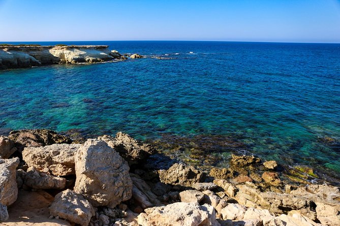 Blue Lagoon and Aphrodite's Baths Guided Day Tour from Paphos - Latchi Harbour lunch and free time