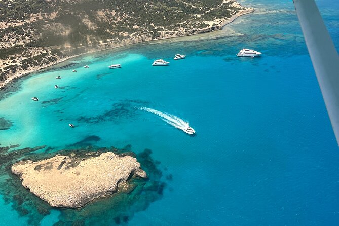 Blue Lagoon Latchi Pafos, boat trip with water slide F/D - Edro III, sea caves, and banana country