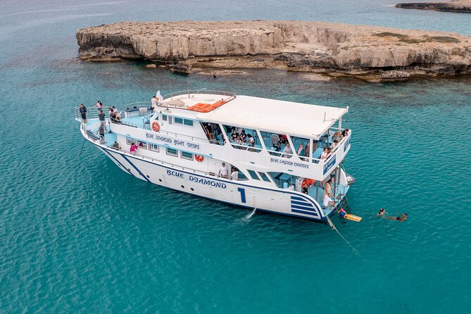 Blue Lagoon trip with slide & music departing from Latchi harbour - Music, the slide, and the mood on board