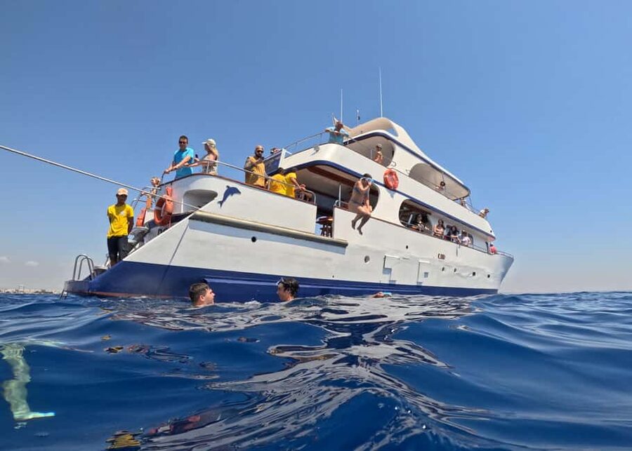 Larnaca: Glass-Bottom Boat Cruise with Fishing and BBQ Lunch - Planes overhead along Larnaca’s west coast