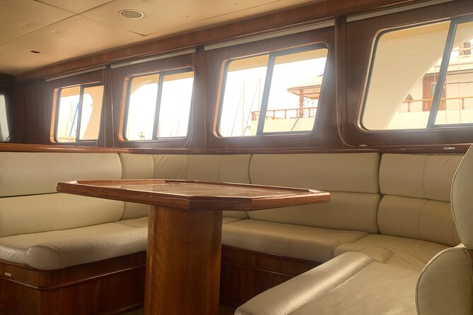 The Original 80/90's & DJ Sunset Cruise - ADULTS 16+ - Passing the beach and Konnos Bay