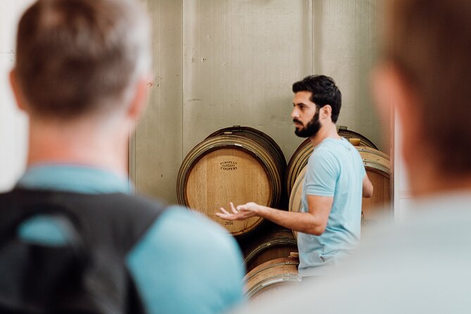 Wine tasting and winery tour at Fikardos Winery - Walking through the barrel room and winemaking areas
